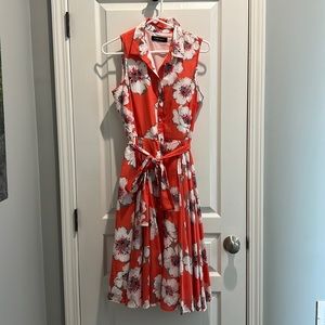 Mid length collared button up dress with tie belt